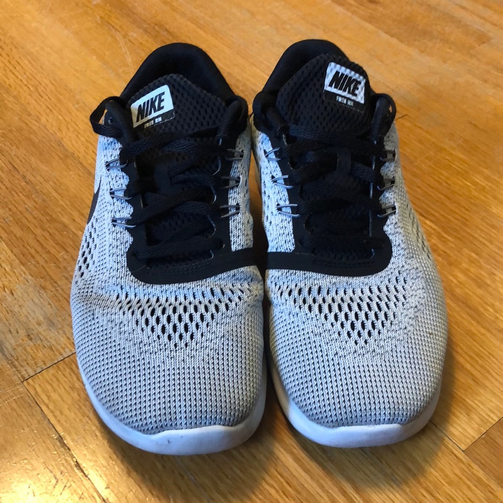 Size 6Y grey/black Nikes